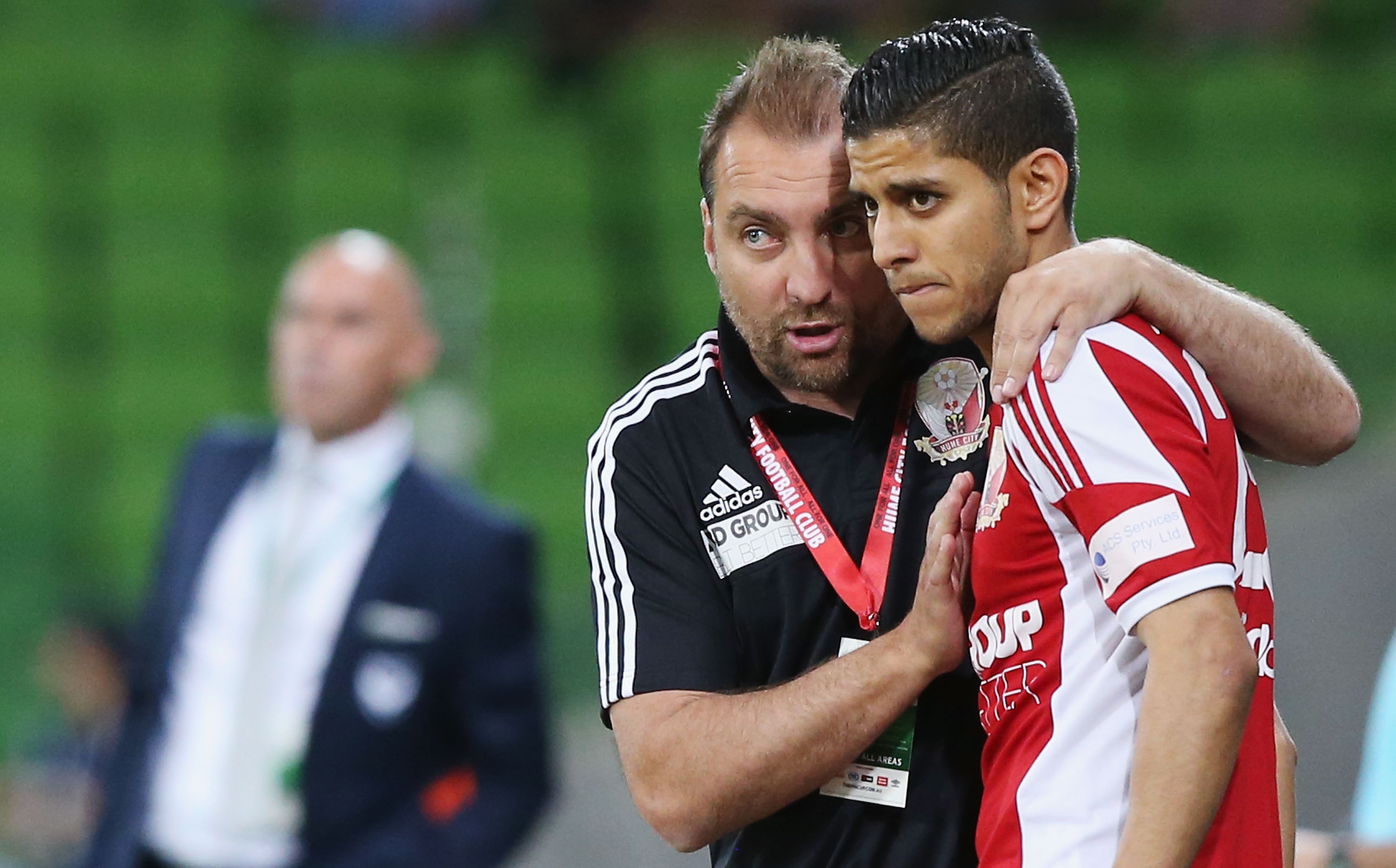 Lou Acevski gives instructions to Souheil Azagane during the FFA Cup Semi Final match between Hume City and Melbourne Victory at AAMI Park on October 28, 2015