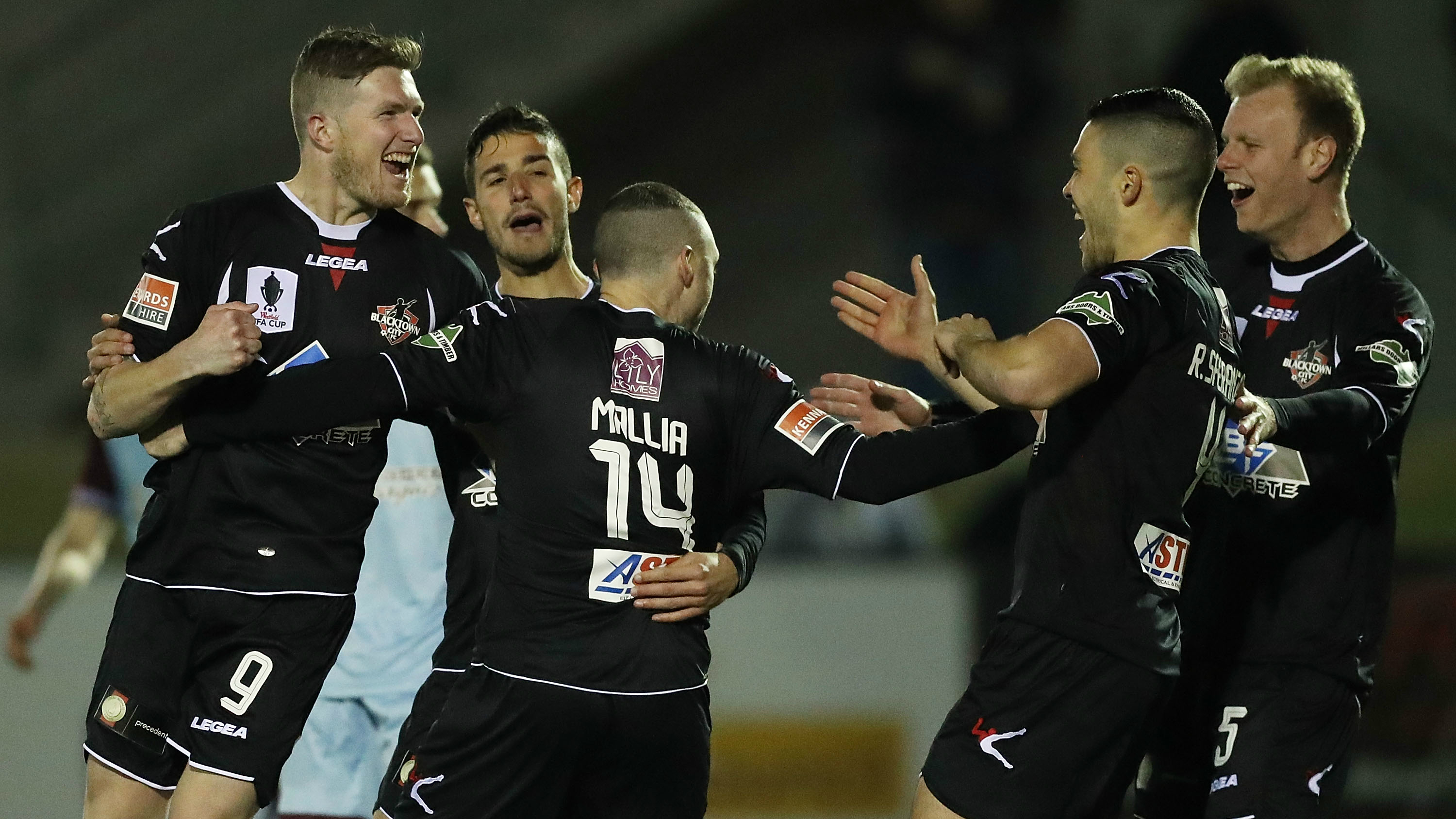 Blacktown City players celebrate a goal in their Westfield FFA Cup Rd of 16 win over APIA Leichhardt.