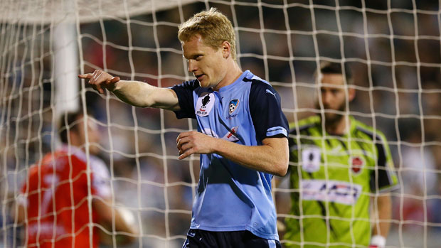 Matt Simon celebrating one of his two goals for Sydney FC against Wollongong in the FFA Cup.