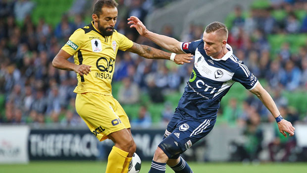 Diego Castro fights for the ball with Besart Berisha in the FFA Cup Final.