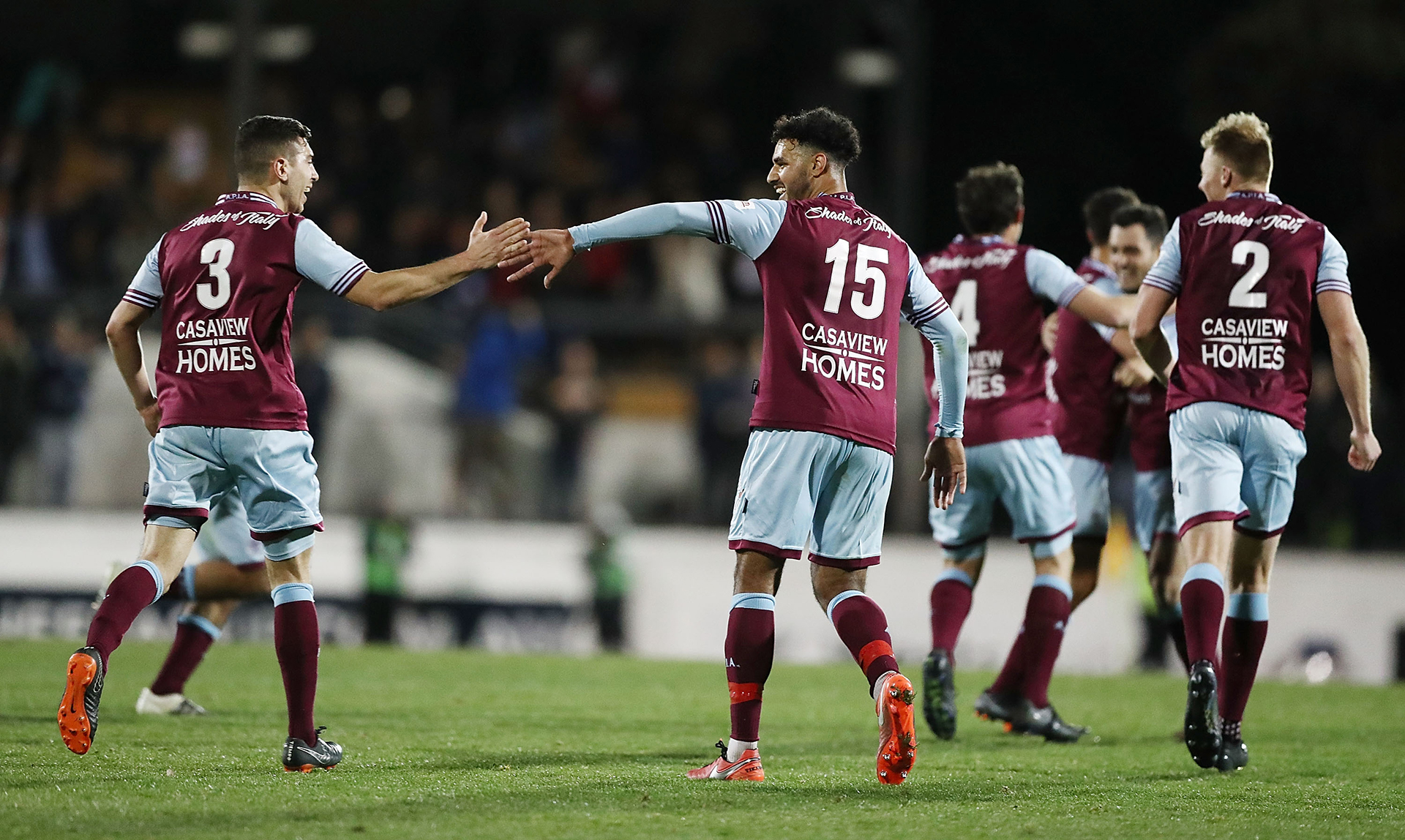 APIA Leichhardt Tigers players celebrate victory in the Australia Cup round of 16 match between APIA Leichhardt Tigers FC and Melbourne Victory at Leichhardt Oval on August 21, 2018