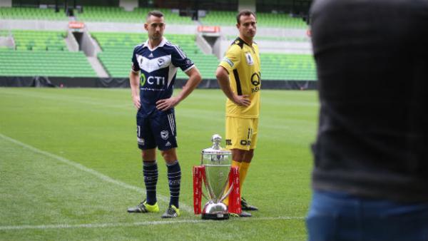 Captains Carl Valeri and Richard Garcia with the Westfield FFA Cup trophy.