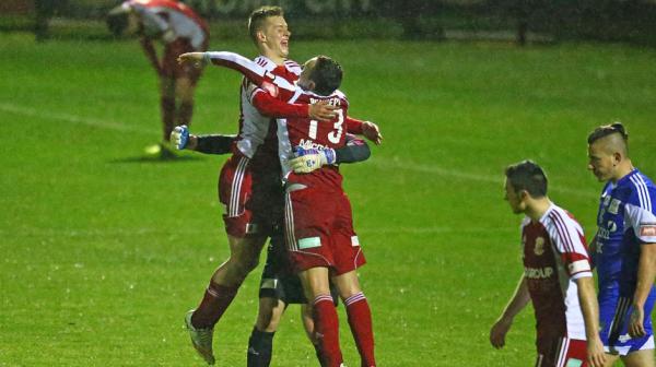 Hume City players celebrate following their 3-2 extra time win over Oakleigh Cannons in 2015.