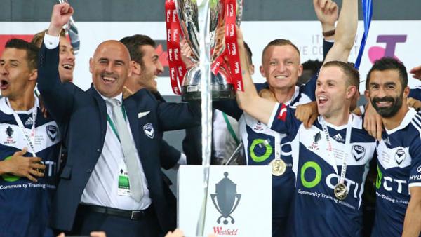 Kevin Muscat celebrates with his side after their FFA Cup Final win over Perth Glory.