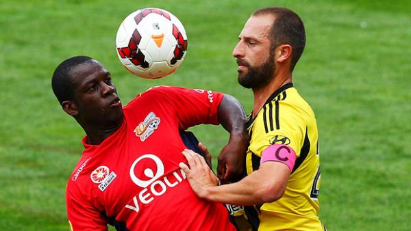Bruce Djite and Andrew Durante compete for the ball during last season's Hyundai A-League.