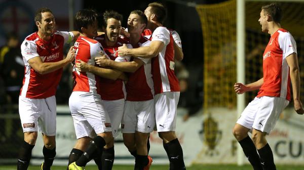 Edgeworth FC players celebrate after opening the scoring against Melbourne City in last season's FFA Cup.