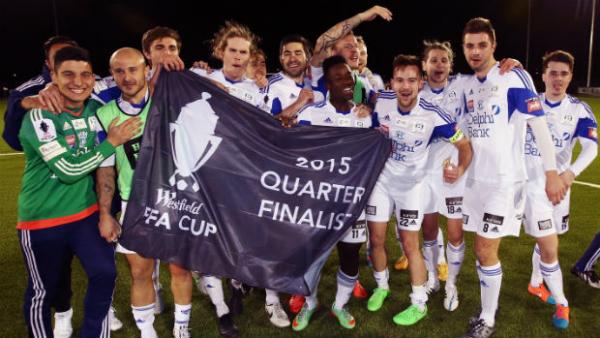 Oakleigh Cannons players celebrate their progression to the Westfield FFA Cup quarter-finals after win over MetroStars.