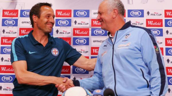 Melbourne City coach John van't Schip shakes hands with Sydney FC boss Graham Arnold on Tuesday.